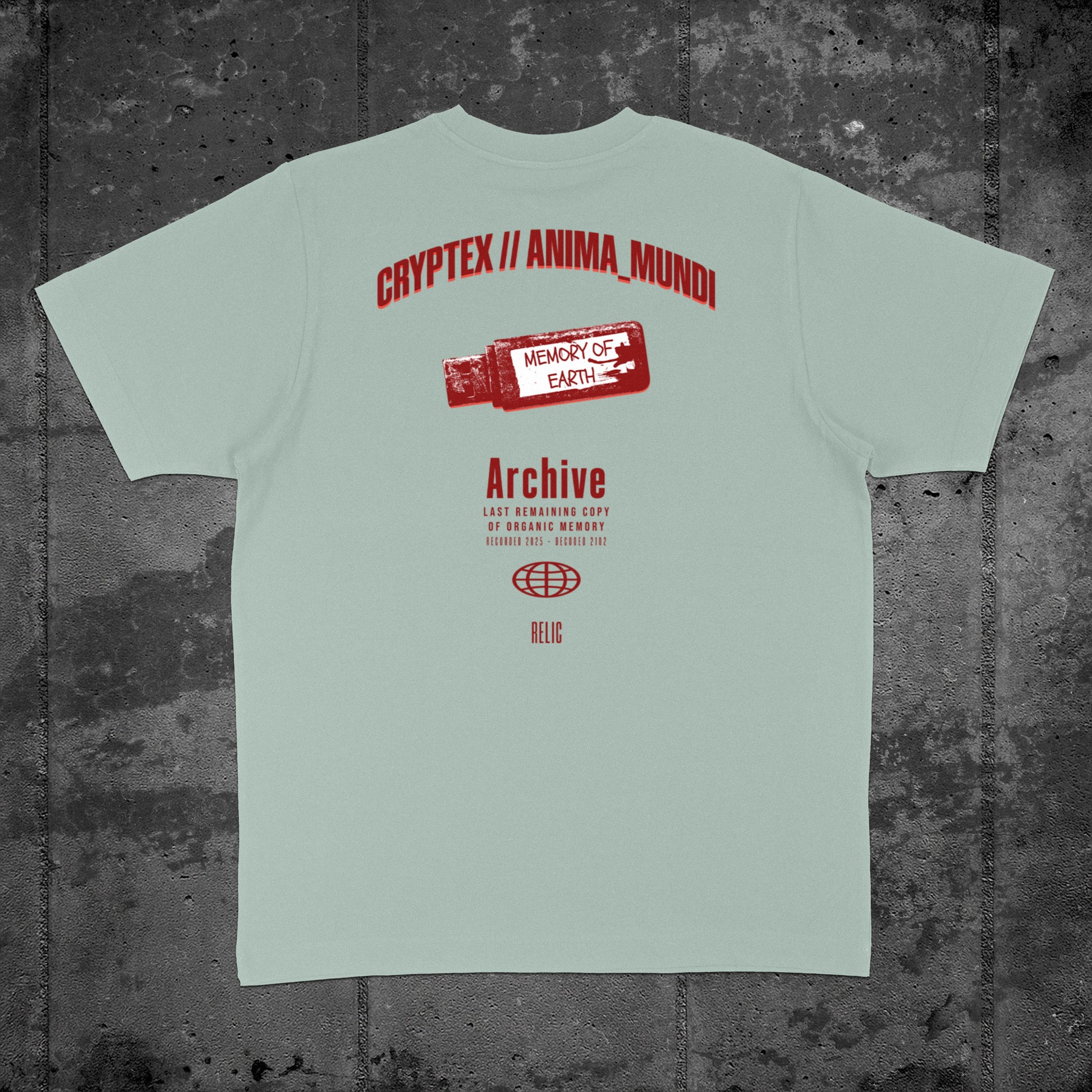 Nachhaltiges Oversized Unisex T-Shirt in Aloe mit Backprint „Relic“ – Flatlay des Stanley/Stella Freestyler von Natura Umbra.